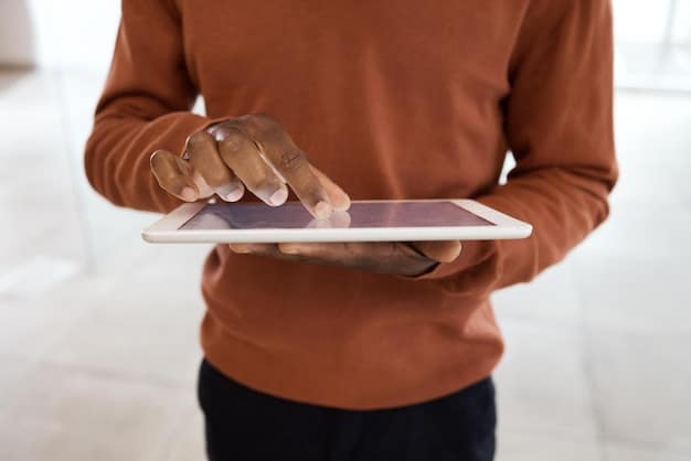 A person holding a tablet displaying an energy audit app. The app shows energy usage data with highlighted areas of high consumption. In the background, various smart home devices are visible, such as a smart thermostat and LED lighting.