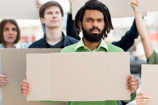 A group of young activists holding signs and participating in a climate change protest, demanding action from political leaders and corporations.