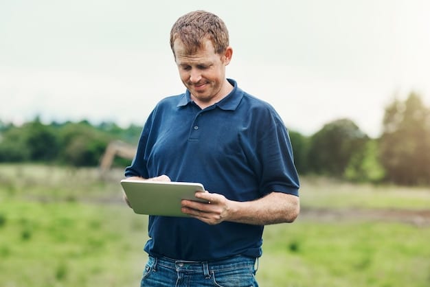 A medium shot of a farmer using a tablet in a field, with a modern tractor equipped with GPS technology visible in the background. The tablet displays data related to soil health and crop yields, illustrating the use of technology in climate-smart agriculture.