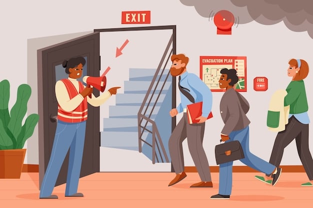 Employees participating in an emergency evacuation drill in their office building, following designated routes and procedures.