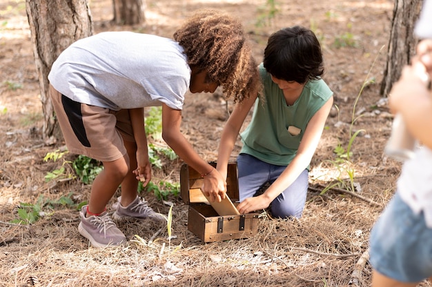 Local community members participating in a tree-planting activity in a deforested area. Show diverse age groups and backgrounds, emphasizing community involvement and a sense of collective responsibility.
